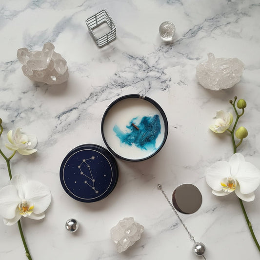 acuario flat lay aralia candles