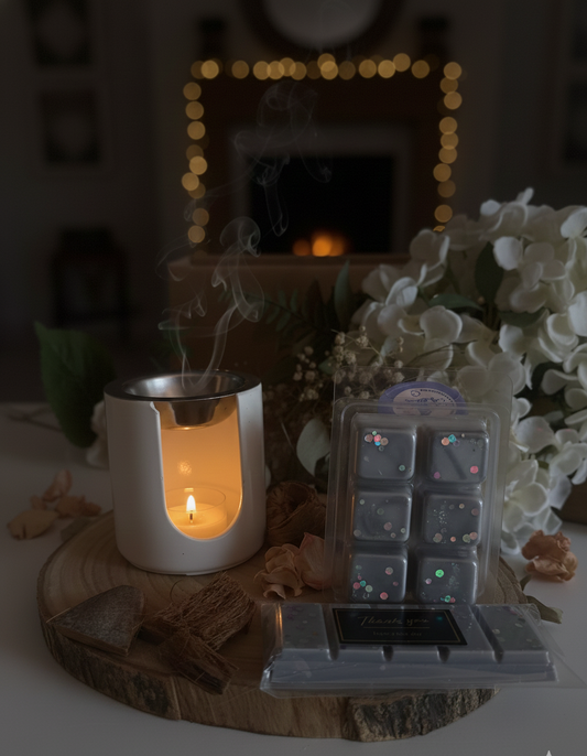 composicion snapbar y waxmelt nocturna Aralia candles